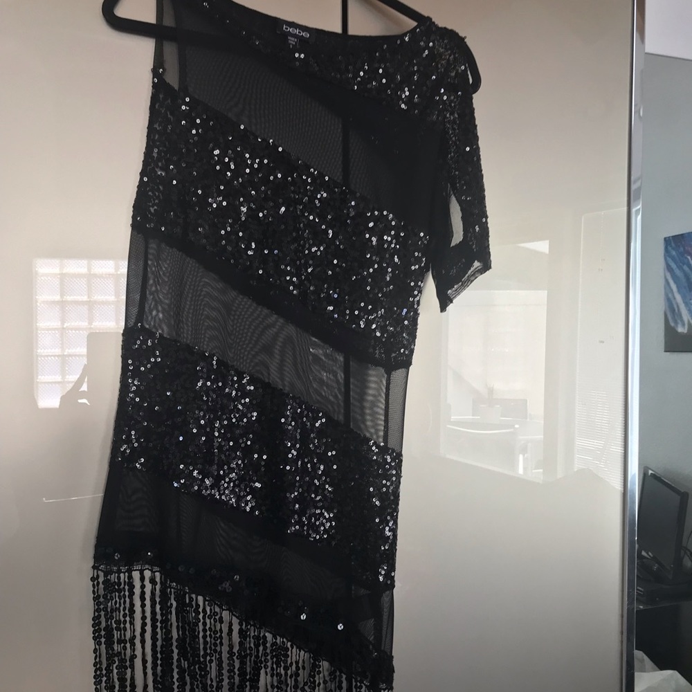 Bebe Asymmetric dress. Black